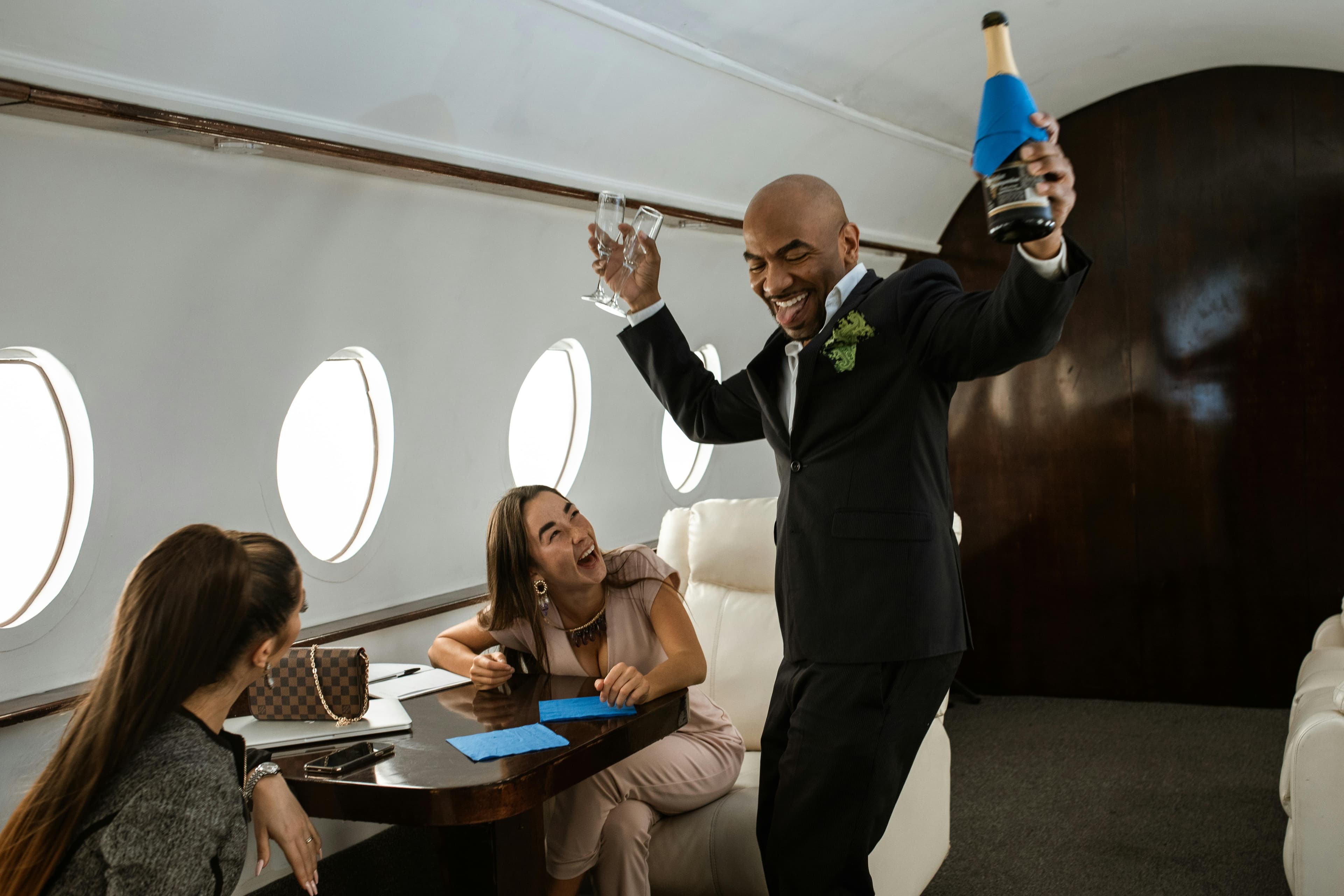 Private Parties - vip people having fun drinking on a private jet